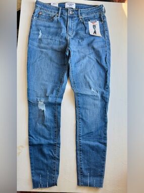 Levi's Women's Distressed Mid Rise Skinny Jean with Raw Hem